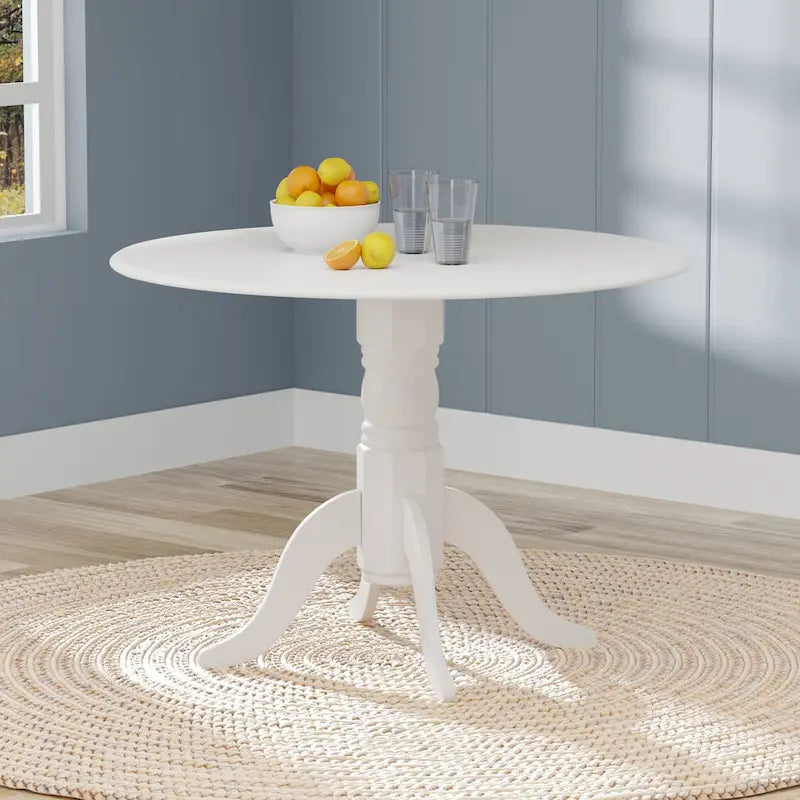 Table de salle à manger ronde à rallonges escamotables pour 4 personnes, coloris blanc/naturel, noir, noyer foncé ou blanc.