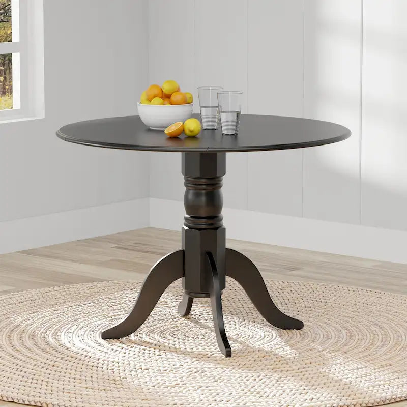 Table de salle à manger ronde à rallonges escamotables pour 4 personnes, coloris blanc/naturel, noir, noyer foncé ou blanc.